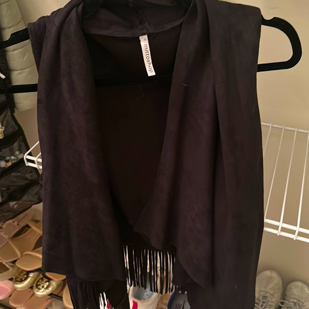 Black fringe suede like vest, size medium. Hardly worn.